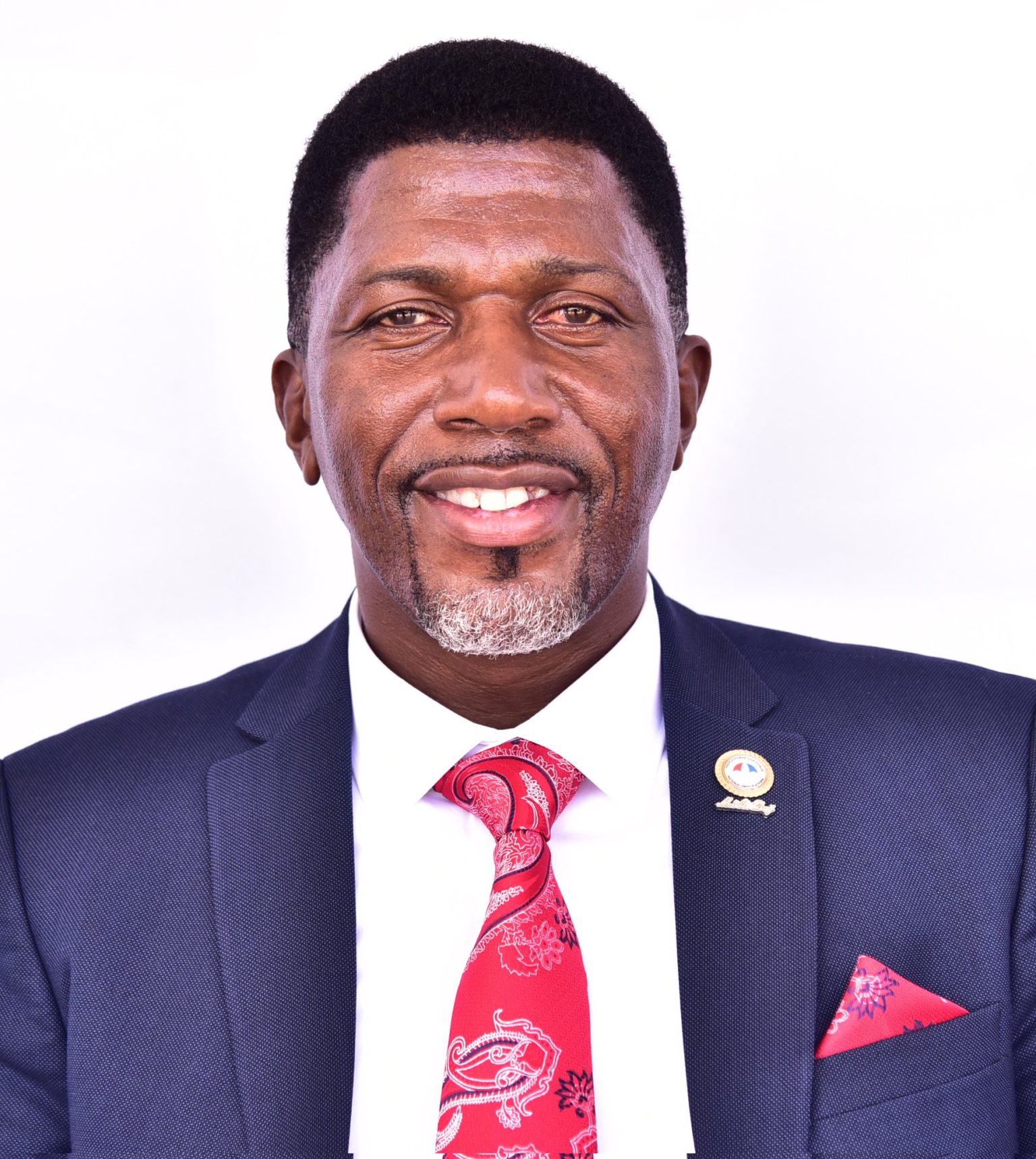 Balimwezo Ronald Nsubuga, Ugandan MP for Nakawa East and Chairperson of Kampala City Roads Committee, in a formal suit