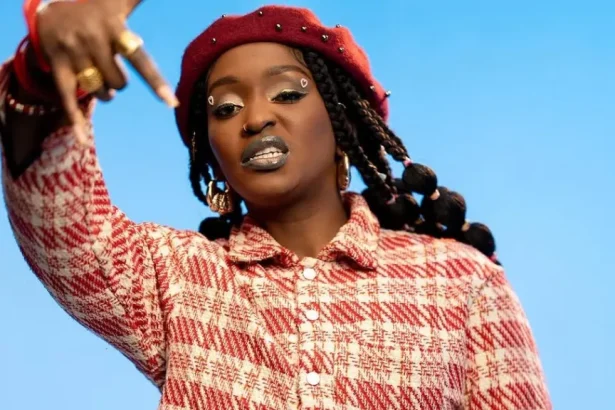 Winnie Nwagi posing confidently in a stylish outfit